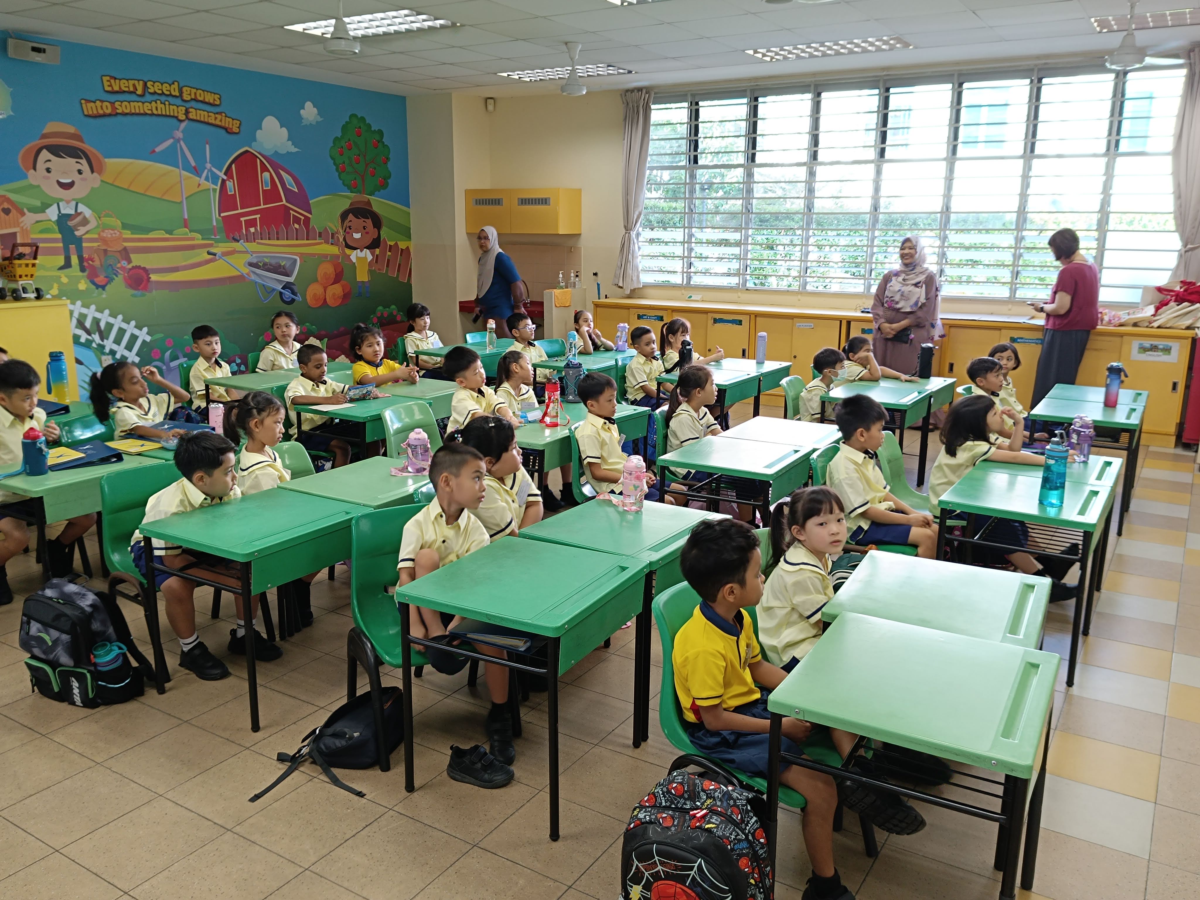 Students in the classroom seeing their classmates for the first time